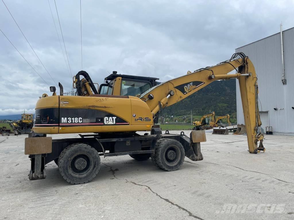 CAT M 318 C MH Jätteenkäsittelijät
