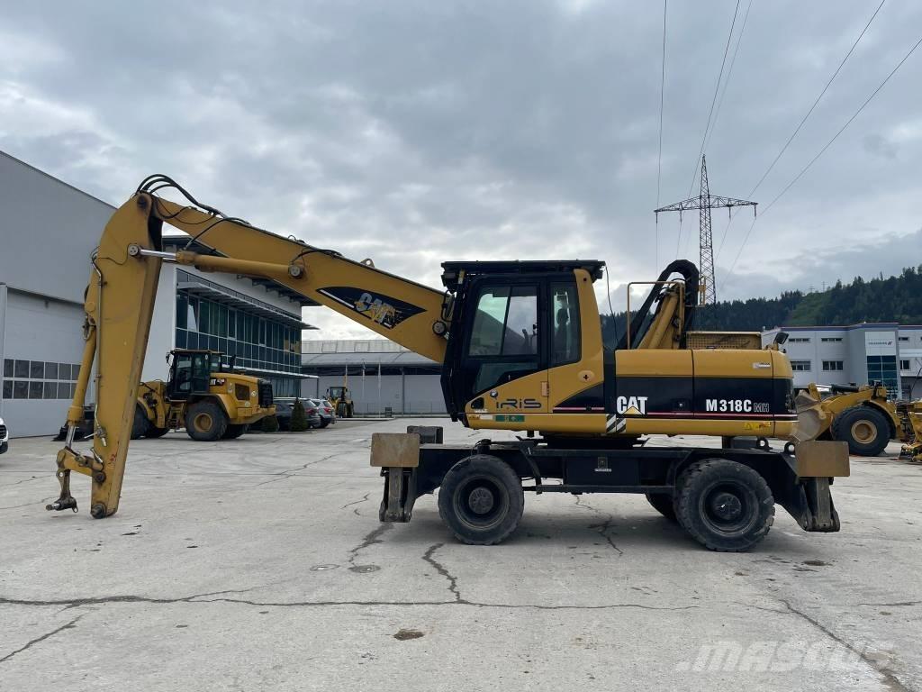 CAT M 318 C MH Jätteenkäsittelijät