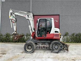 Takeuchi TB295W Pyöräkaivukoneet