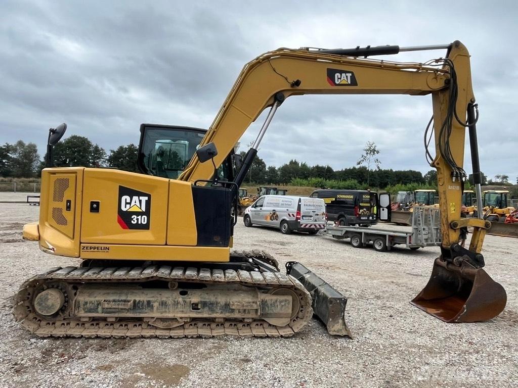CAT 310 Midikaivukoneet 7t - 12t