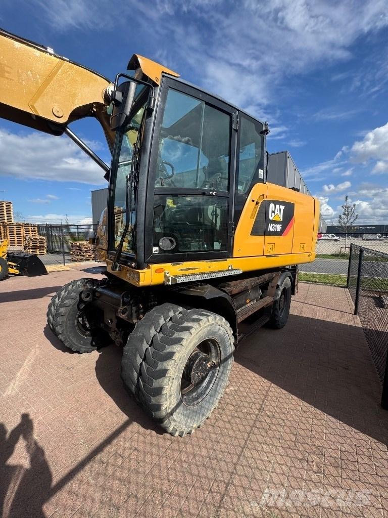 CAT 318 Pyöräkaivukoneet