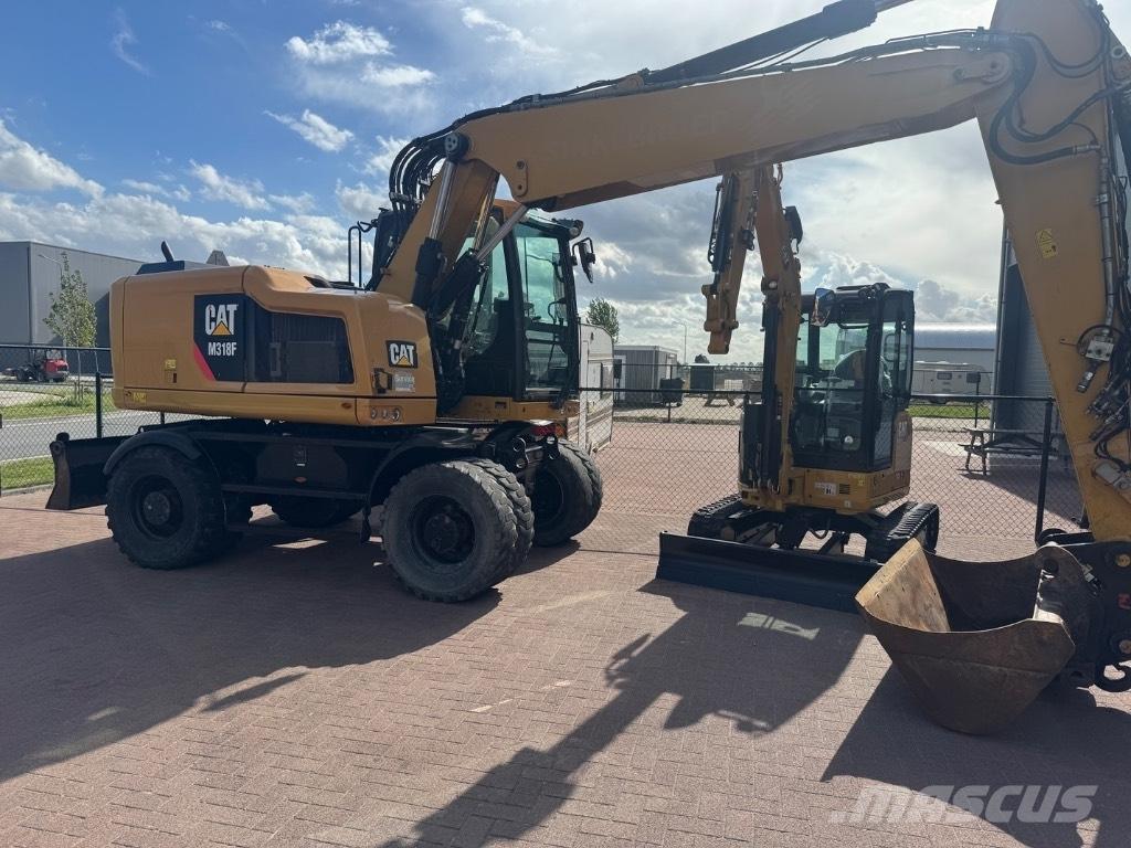 CAT 318 Pyöräkaivukoneet