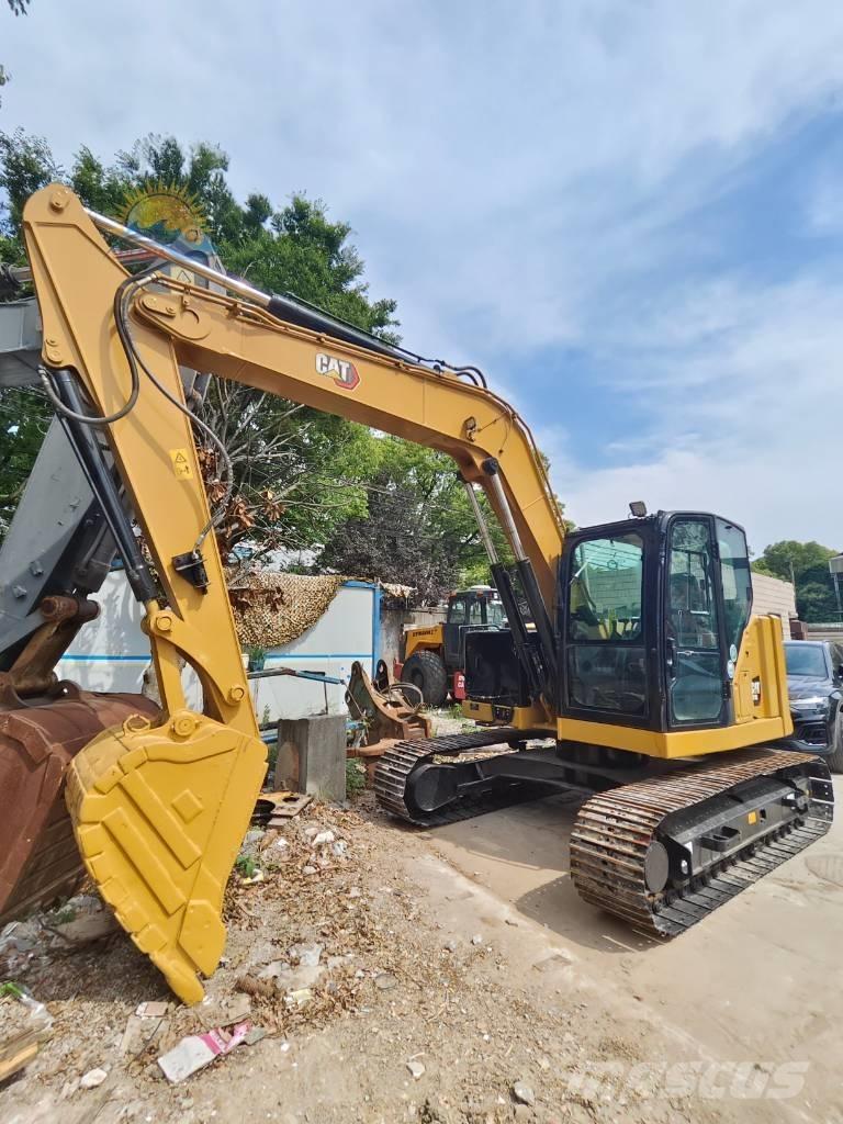 CAT 310 Telakaivukoneet