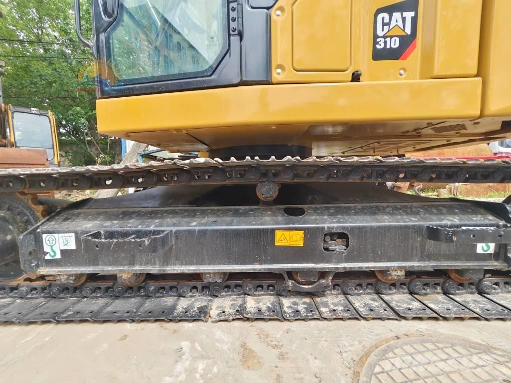 CAT 310 Telakaivukoneet