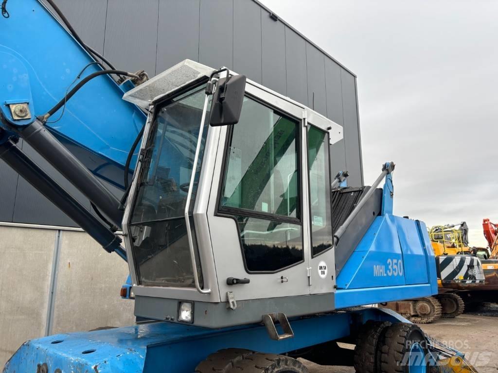 Fuchs MHL350  --  MHL 350 Jätteenkäsittelijät