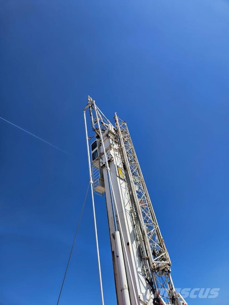 Spierings AT5 - 599 Itsensä kokoavat nosturit