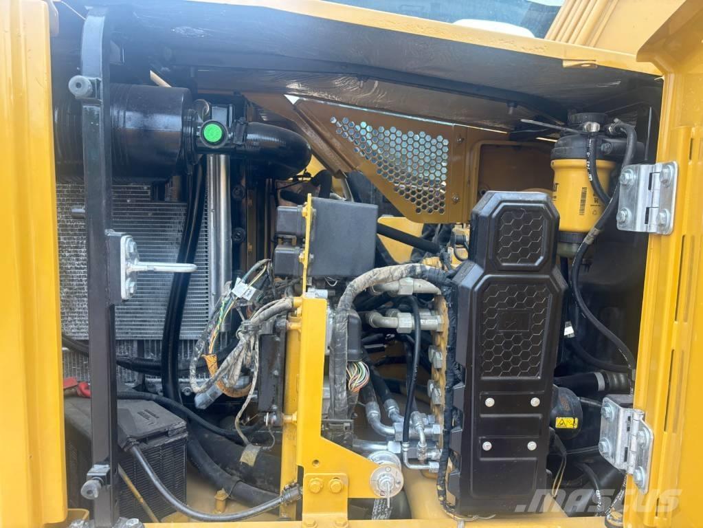 CAT 310 Telakaivukoneet