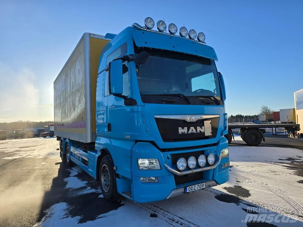 MAN TGX 28.560 Kontti-/tasonostoautot