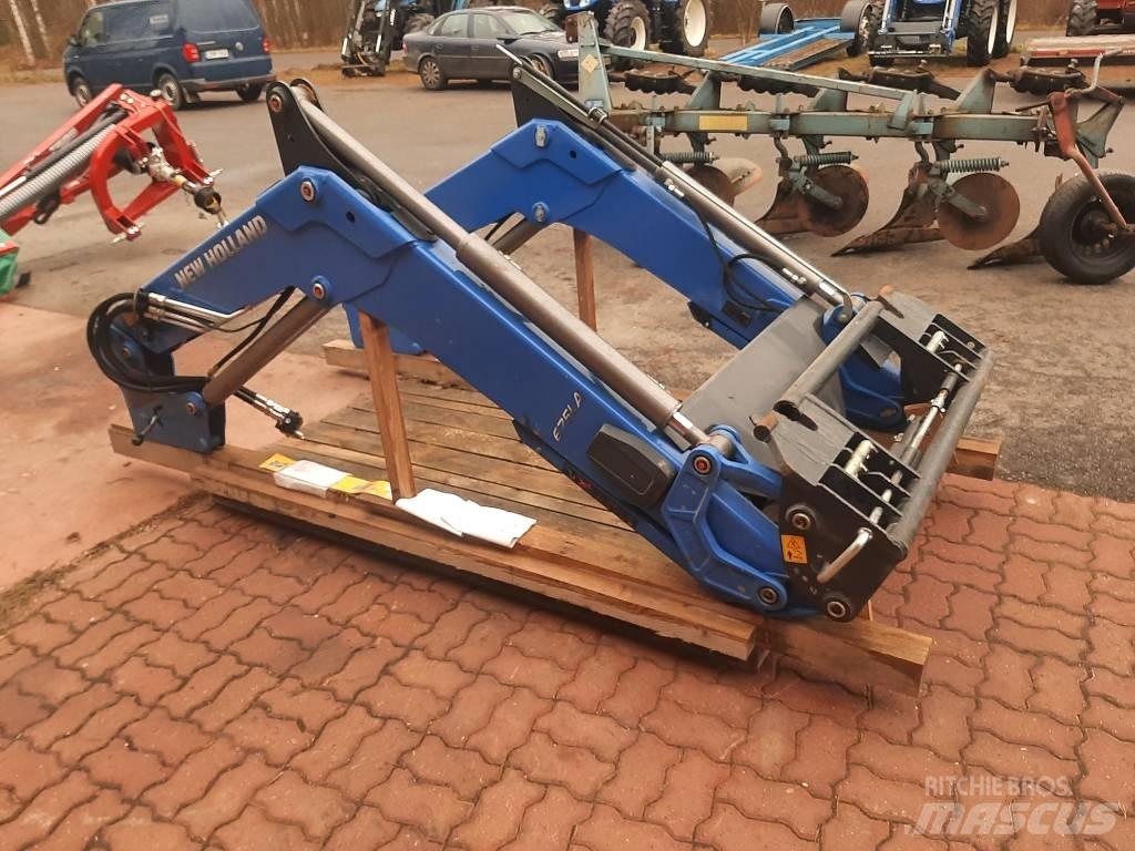 New Holland 675 LA Etukuormaimet ja kaivuulaitteet