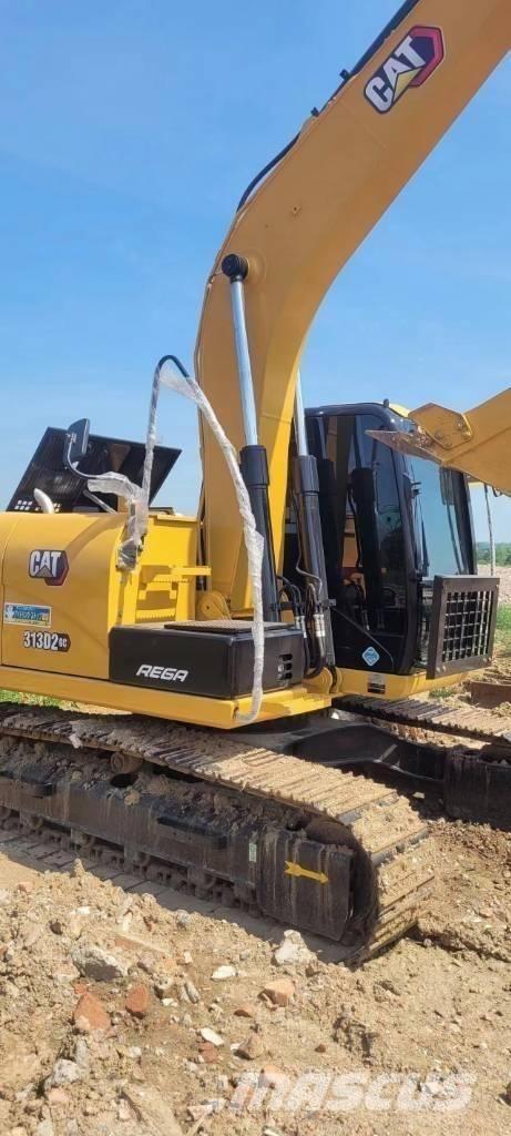 CAT 313 Midikaivukoneet 7t - 12t