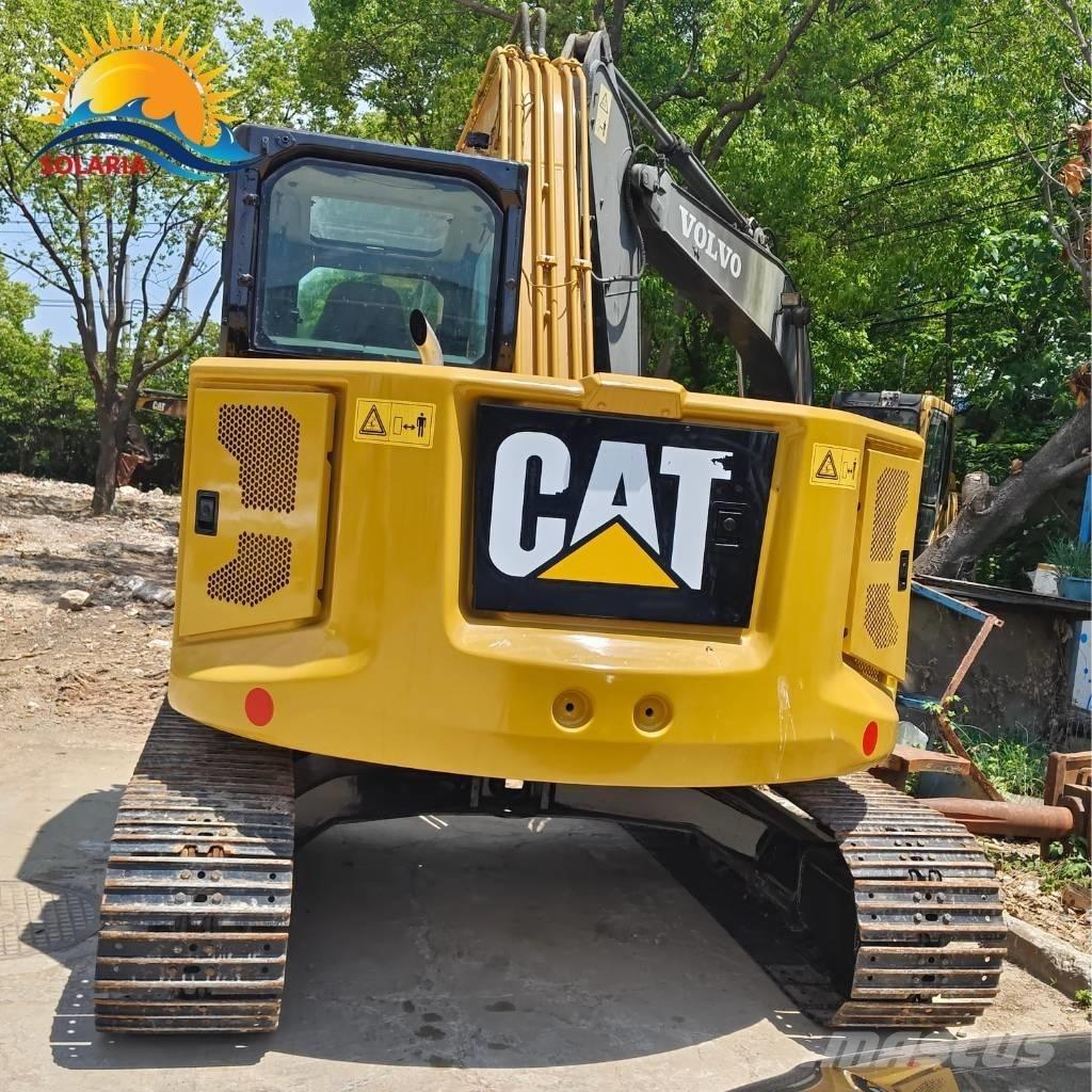 CAT 310 Telakaivukoneet