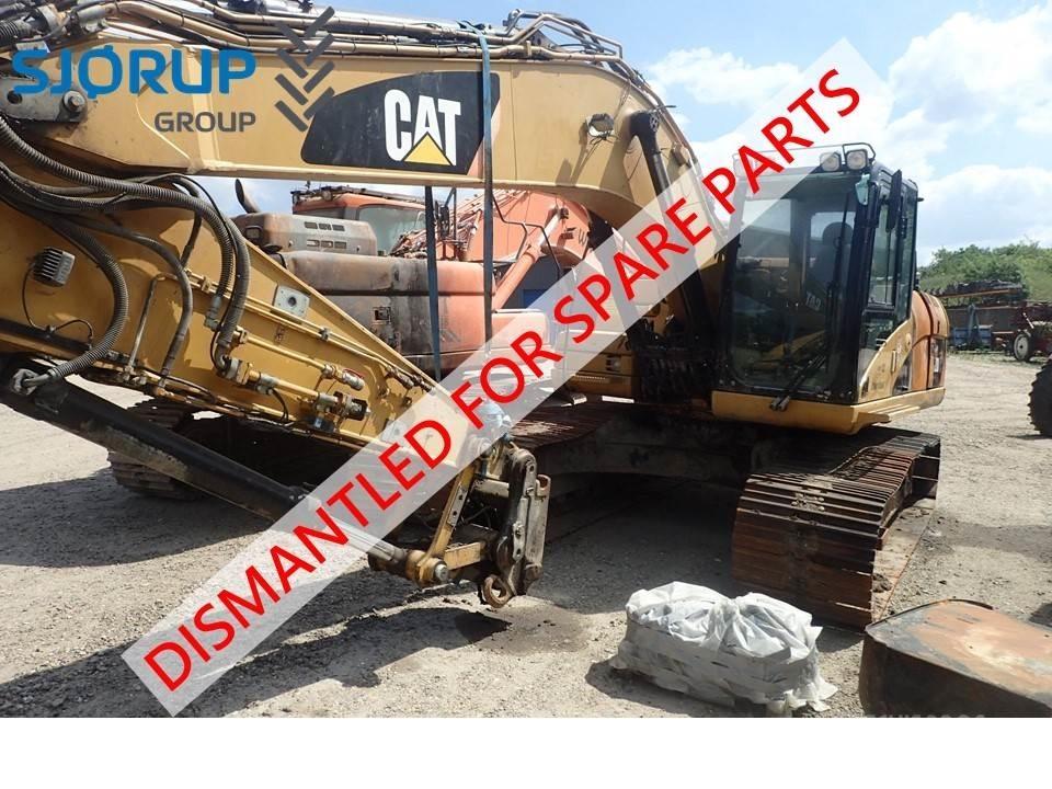 CAT 323D Traktorit