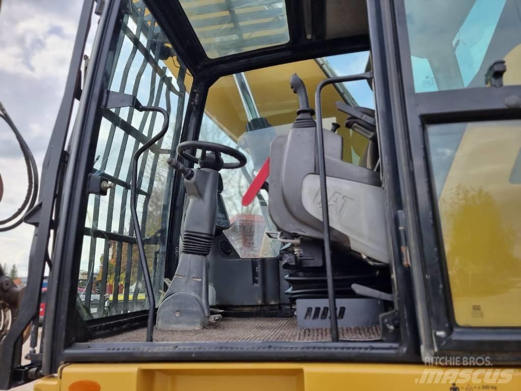CAT MH 3022 Jätteenkäsittelijät