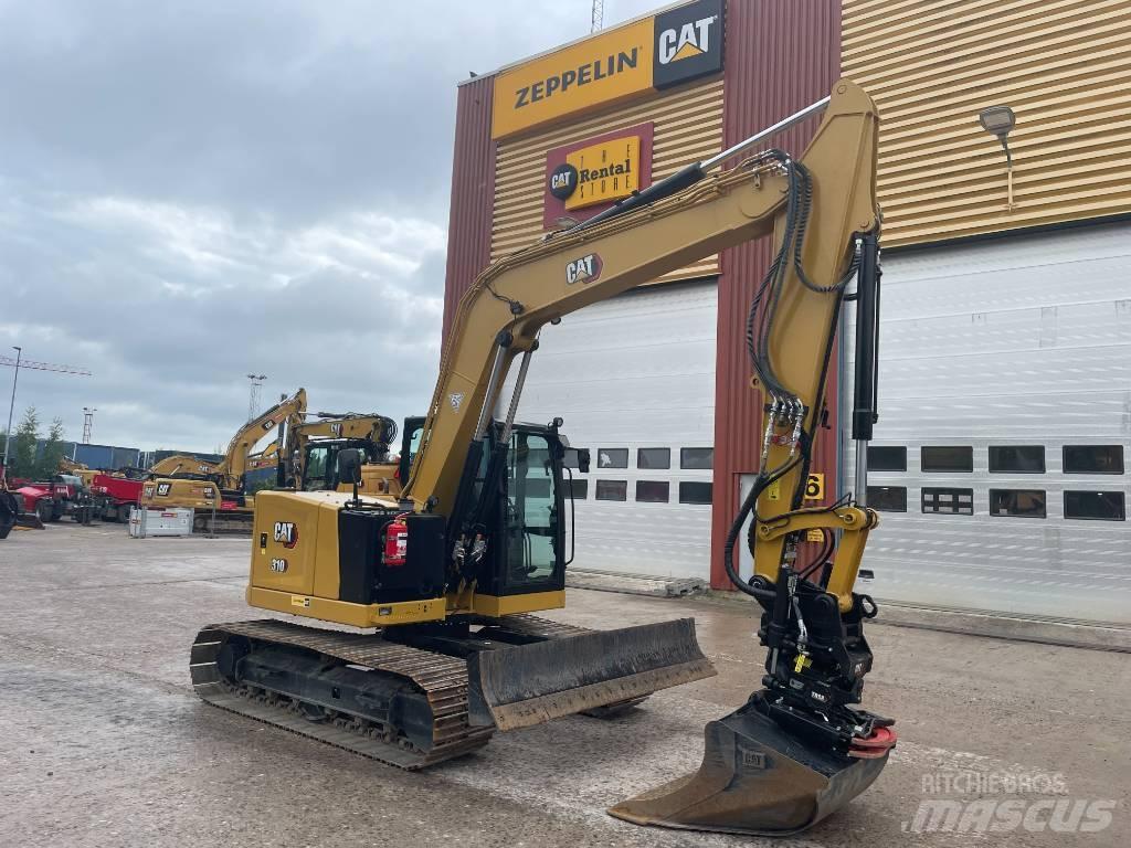 CAT 310 Telakaivukoneet