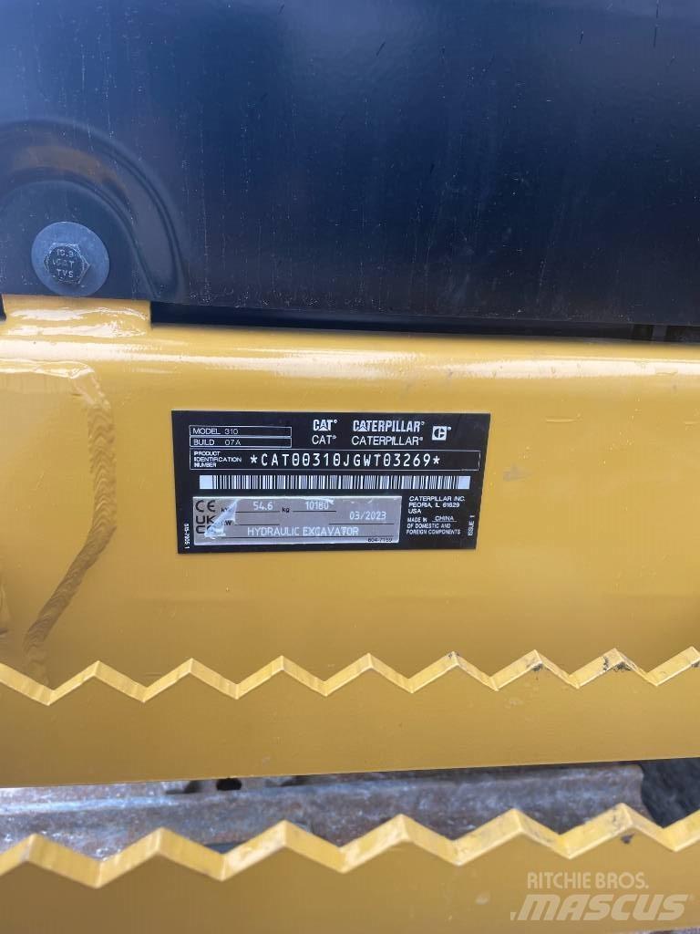 CAT 310 Telakaivukoneet