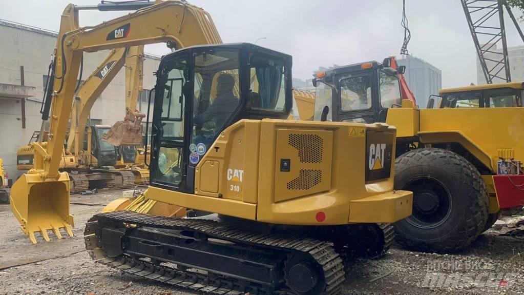 CAT 310 Telakaivukoneet