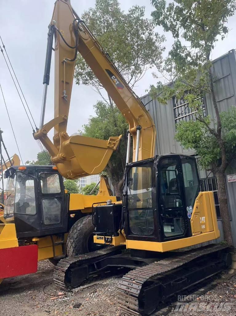 CAT 310 Telakaivukoneet