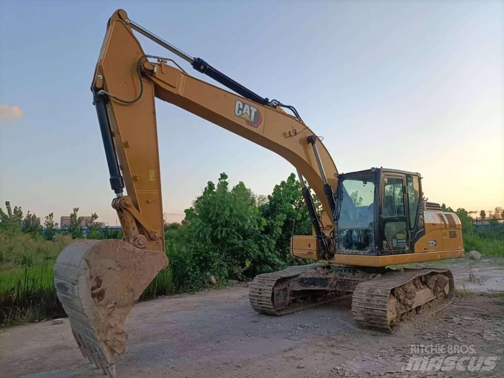 CAT CAT 323GX Amfibio-kaivinkoneet