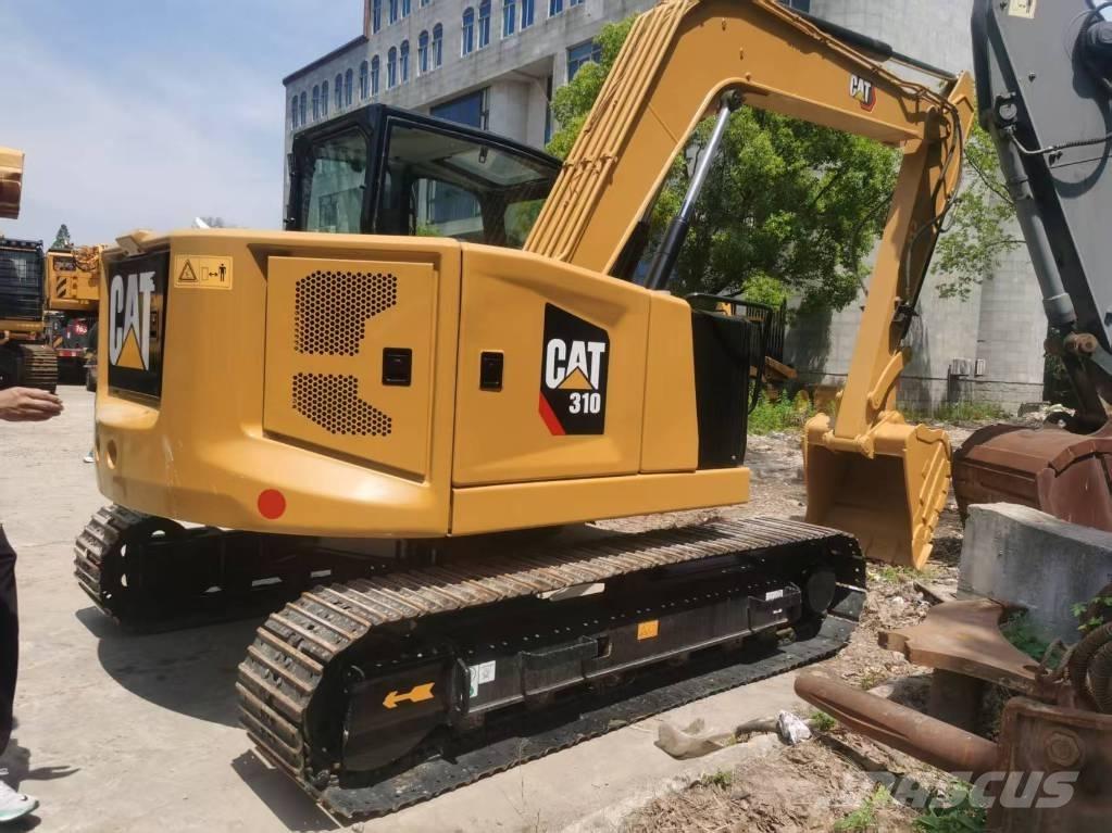 CAT 310 Telakaivukoneet