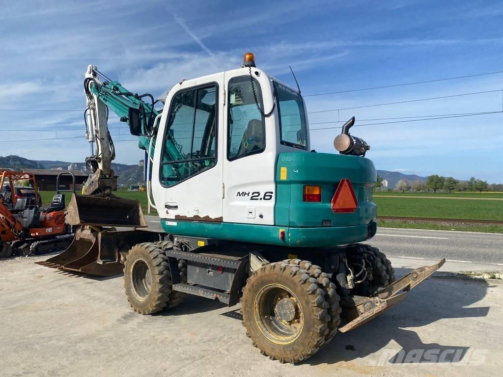 New Holland MH 2.6 Pyöräkaivukoneet