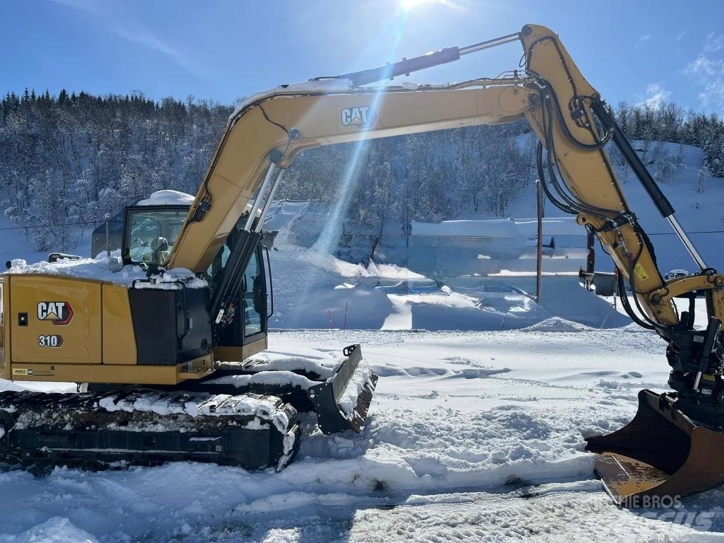 CAT 310 Telakaivukoneet