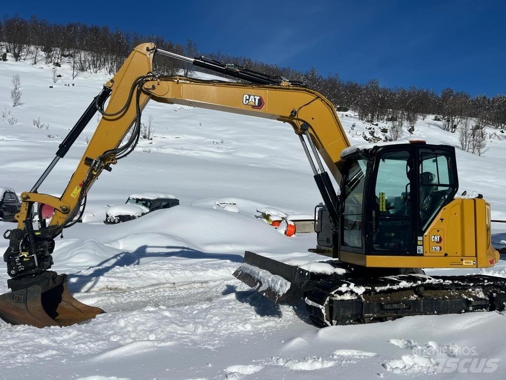 CAT 310 Telakaivukoneet