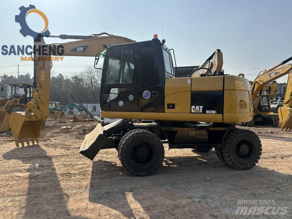 CAT M 320 D Pyöräkaivukoneet