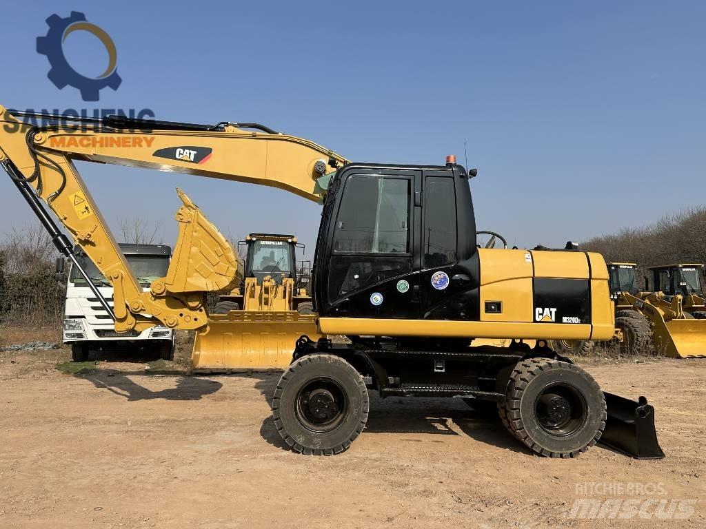 CAT M 320 D2 Pyöräkaivukoneet