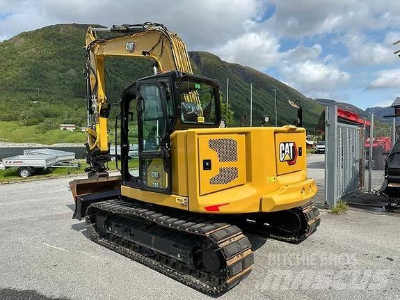 CAT 310 Telakaivukoneet