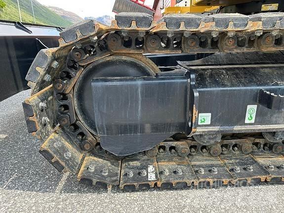 CAT 310 Telakaivukoneet