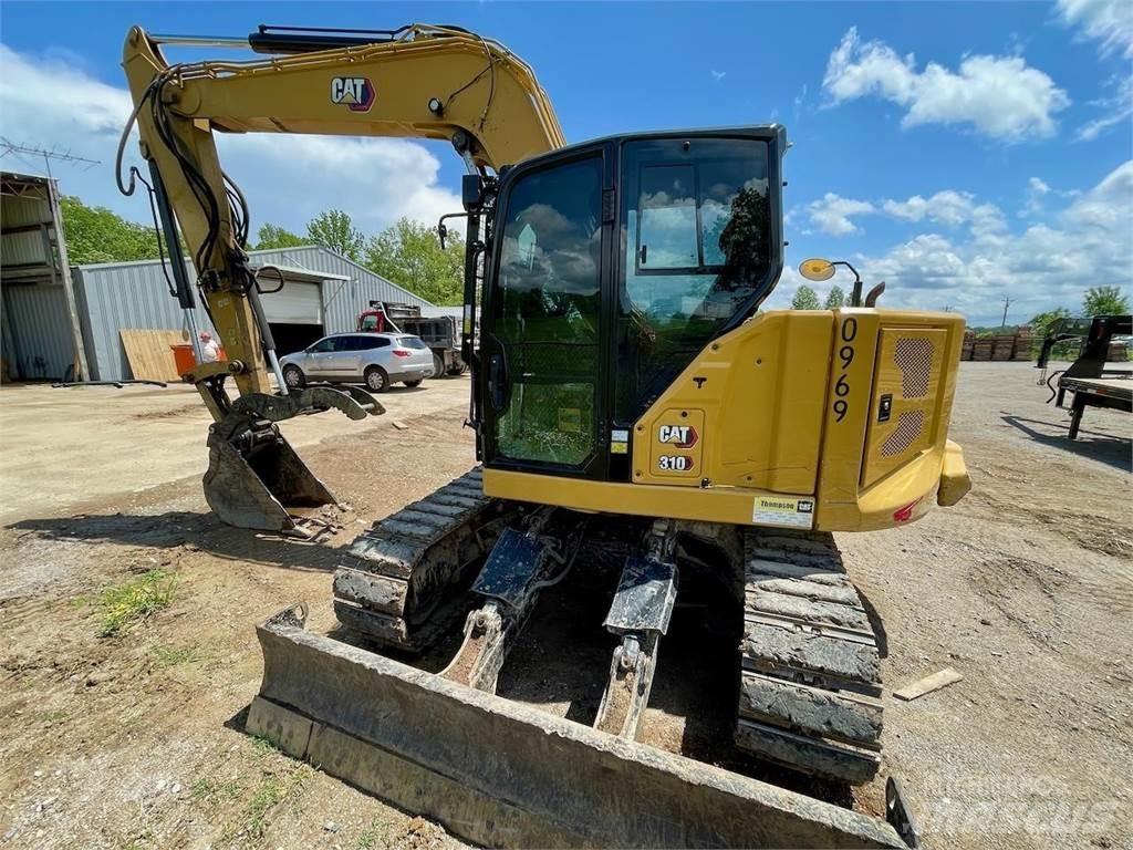 CAT 310 Telakaivukoneet