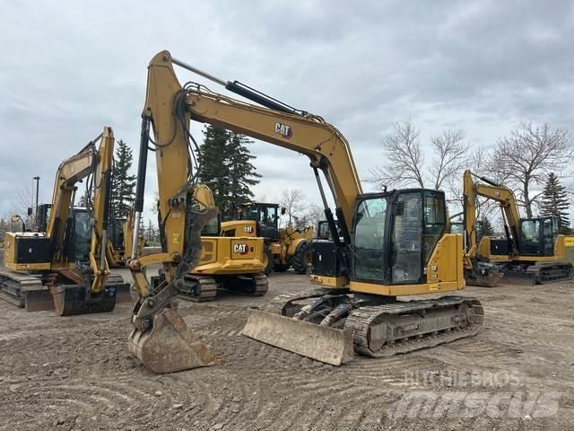 CAT 310 Telakaivukoneet