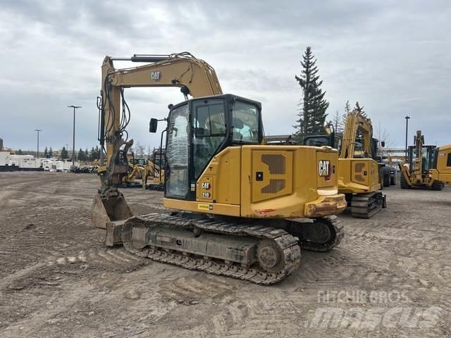 CAT 310 Telakaivukoneet