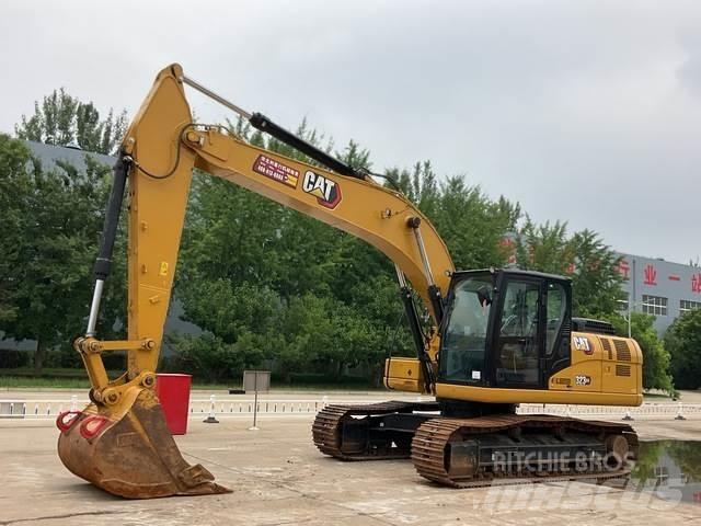 CAT 323GX Telakaivukoneet