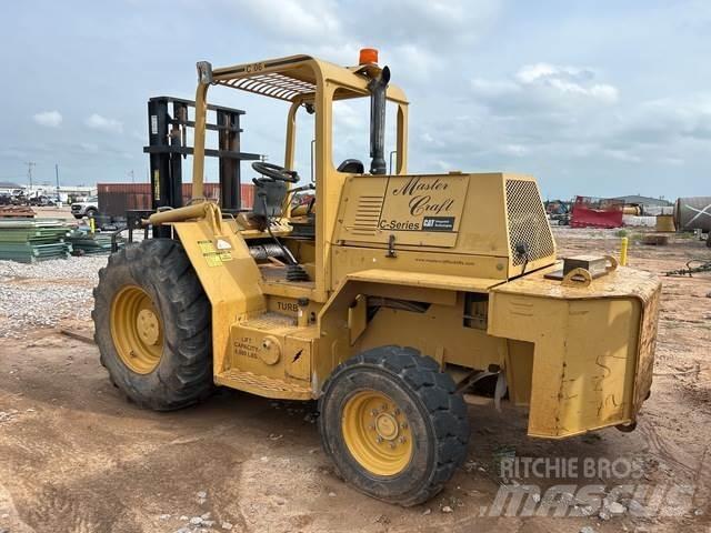 CAT C0610106 Maastotrukit
