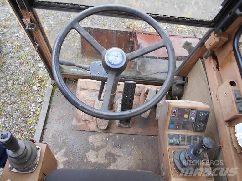 CAT 212B FT Pyöräkaivukoneet