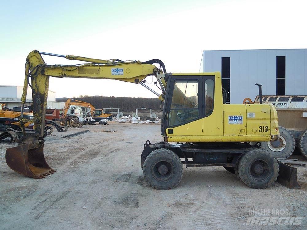 CAT M312 Pyöräkaivukoneet