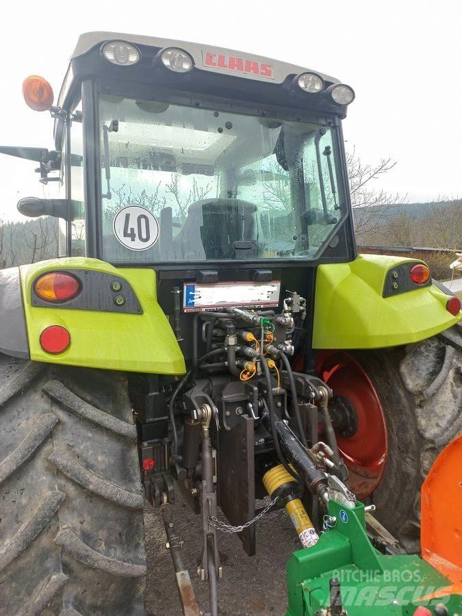 CLAAS Axos 330 CX Traktorit