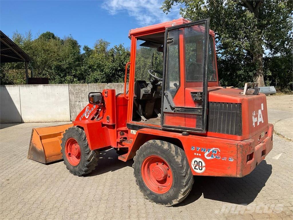 Fai 556 Etukuormaimet ja kaivuulaitteet