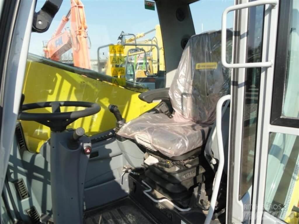 New Holland WE210 Pyöräkaivukoneet