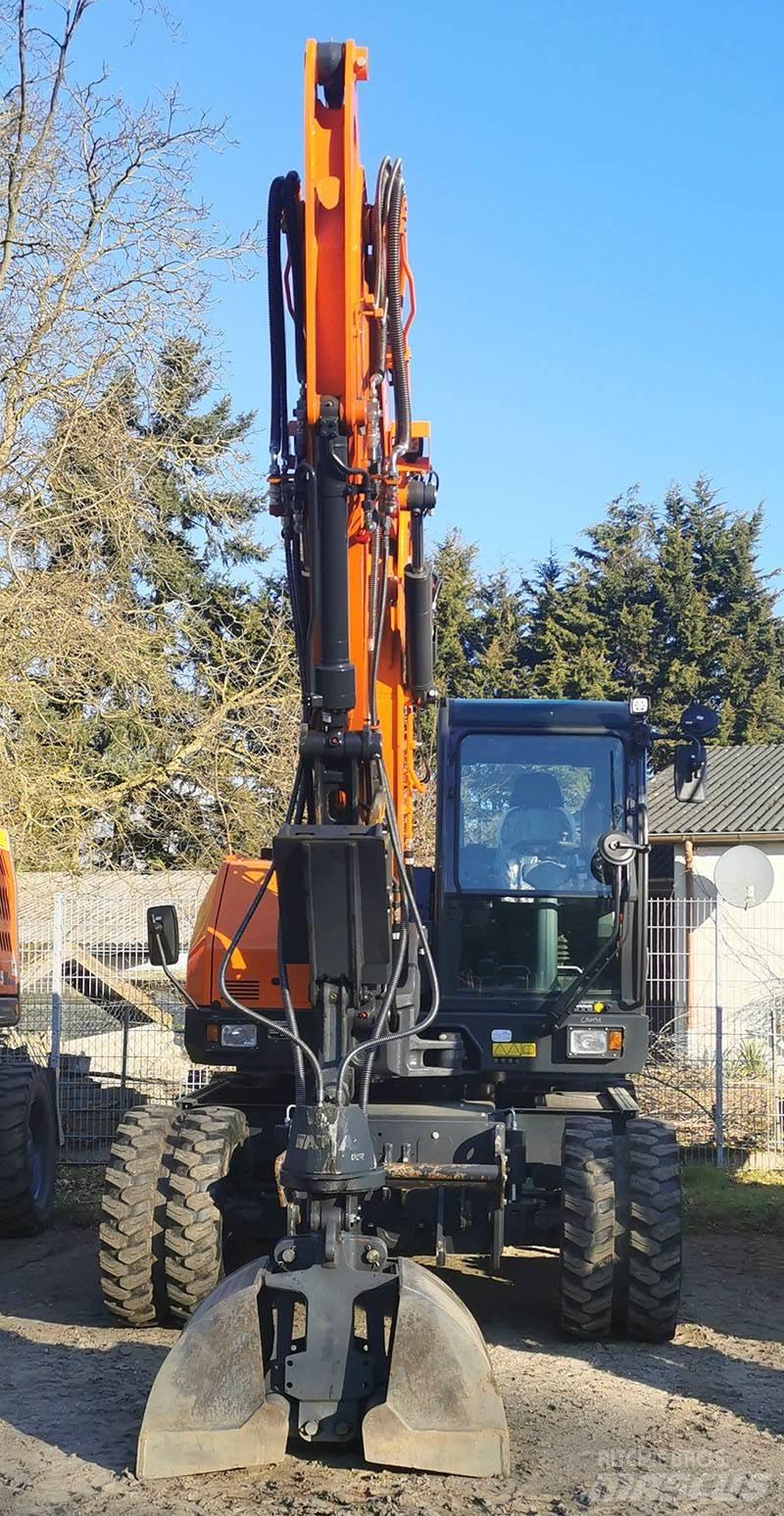 Develon DX 100 W-7 Pyöräkaivukoneet