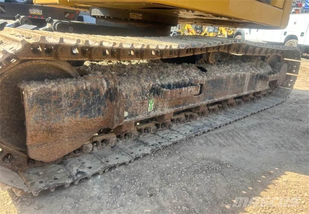 CAT 310 Telakaivukoneet