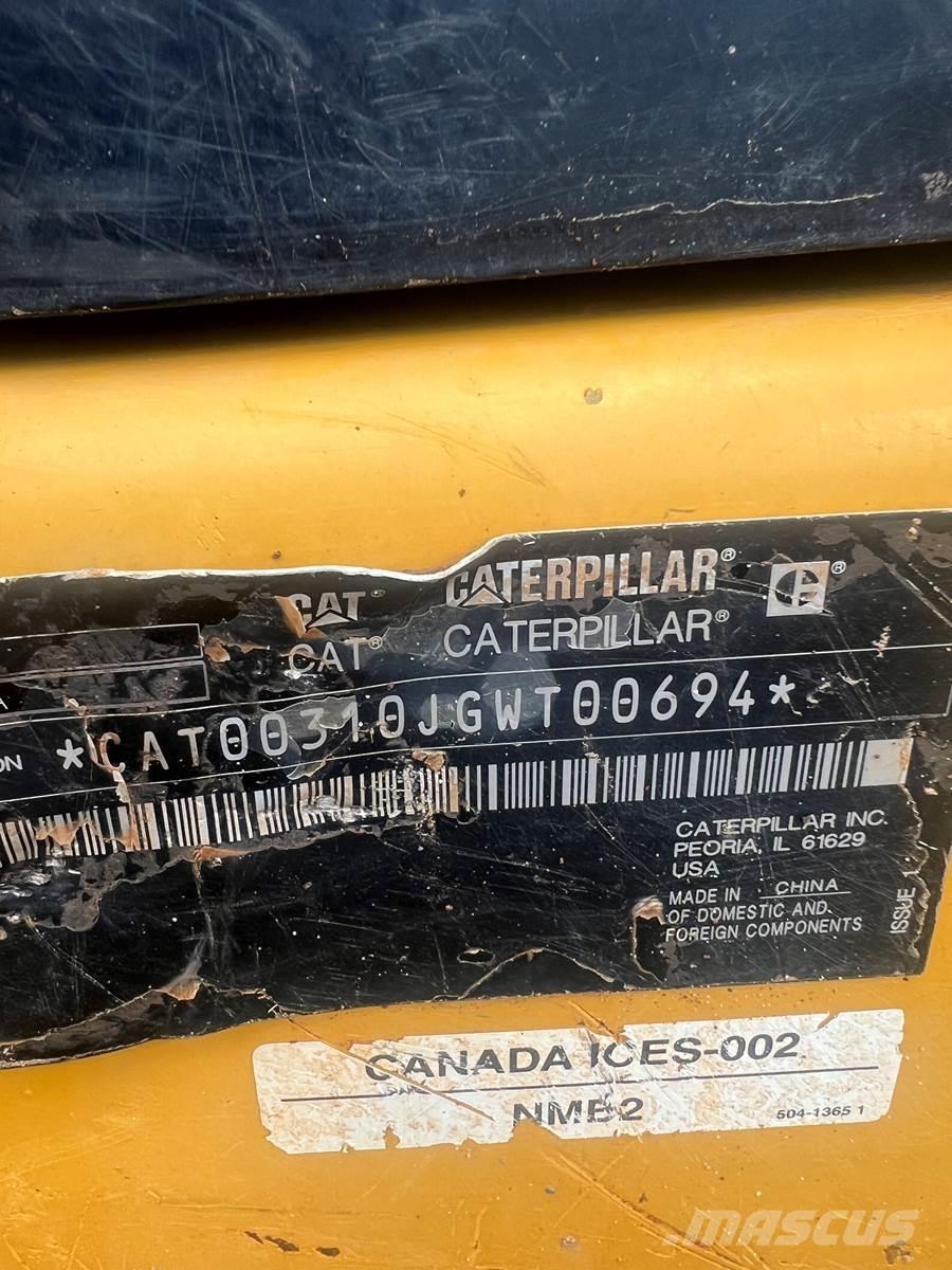 CAT 310 Telakaivukoneet