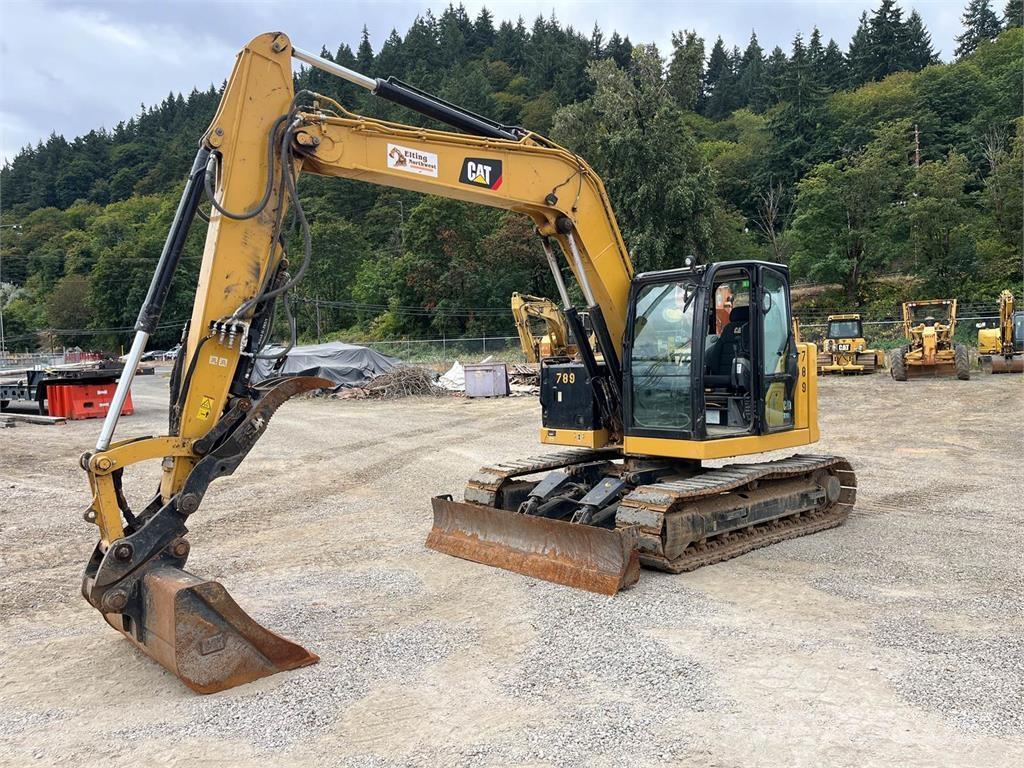CAT 310 Telakaivukoneet