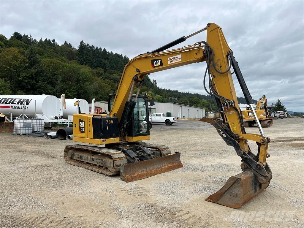 CAT 310 Telakaivukoneet