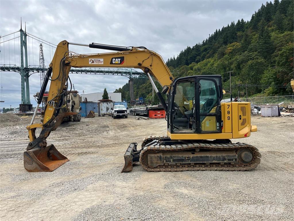 CAT 310 Telakaivukoneet