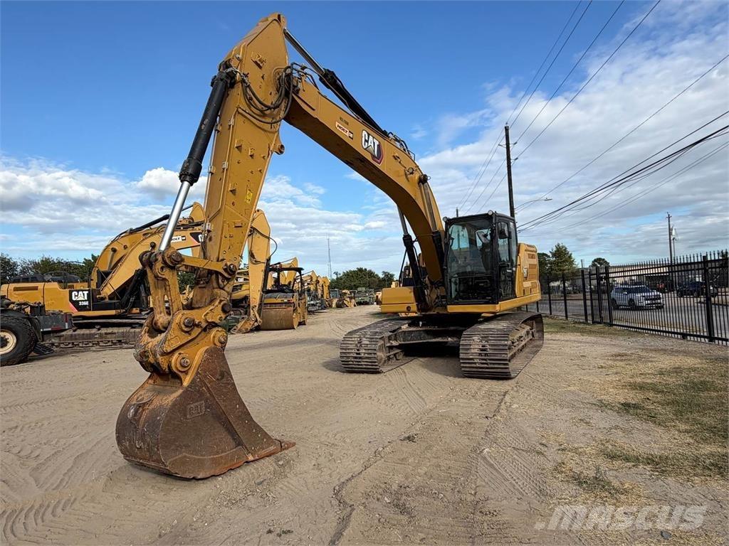 CAT 323 Telakaivukoneet