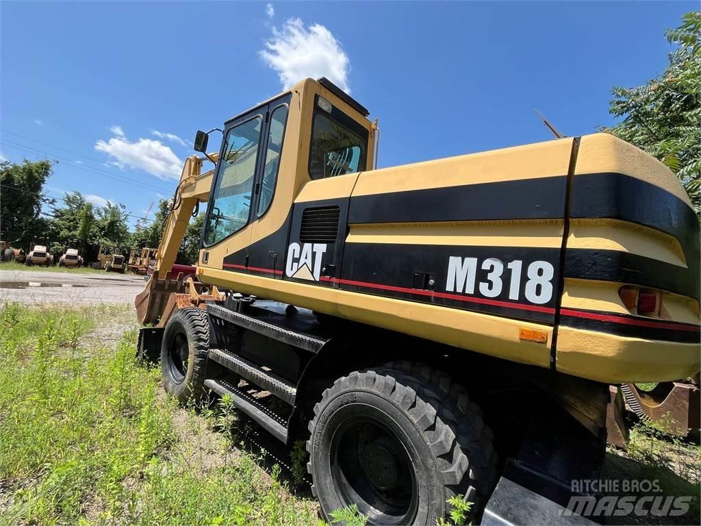CAT M318 Pyöräkaivukoneet
