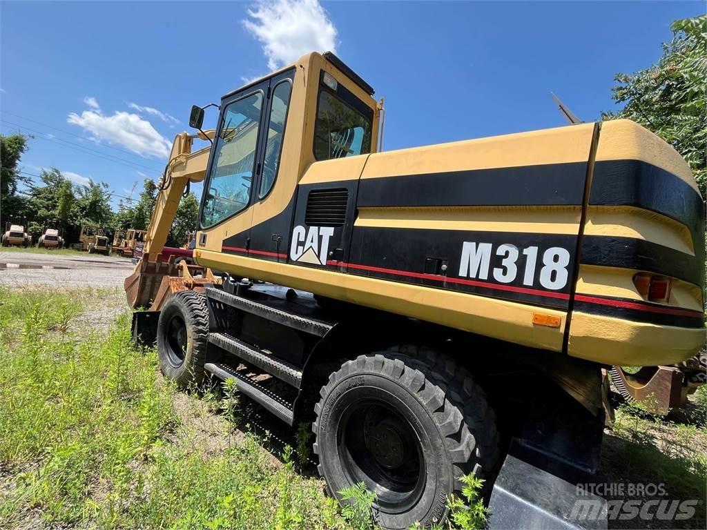 CAT M318 Pyöräkaivukoneet
