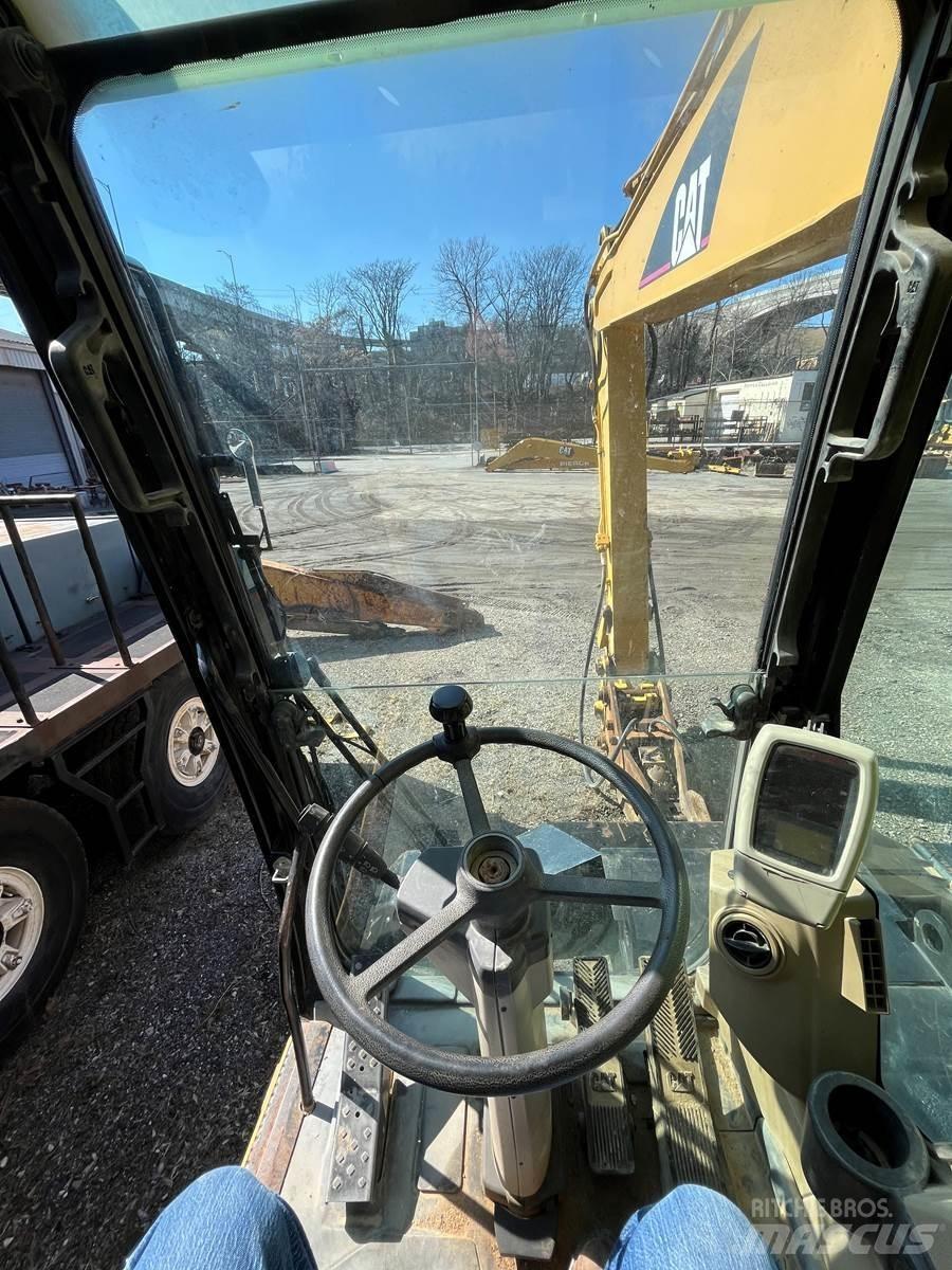 CAT M318C Pyöräkaivukoneet
